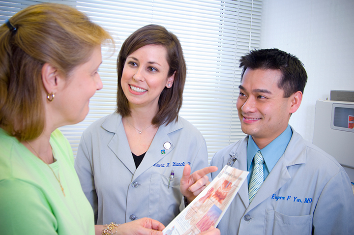 Dr. Laura Bianchi and Dr. Eugene Yen with patient