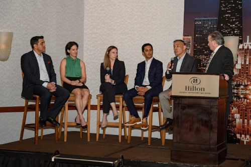 The event panelists (seated from left to right): Dr. Ravi Bashyal, Dr. Hallie Labrador, Dr. Nicole Reams, Dr. Nirav Shah, and Dr. Walter Whang answering a question, along with moderator Dr. Julian Bailes.