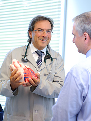 A doctor consulting with a patient on heart and vascular care