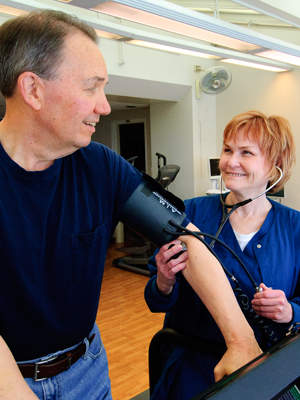 A doctor managing a patient's cardiac care