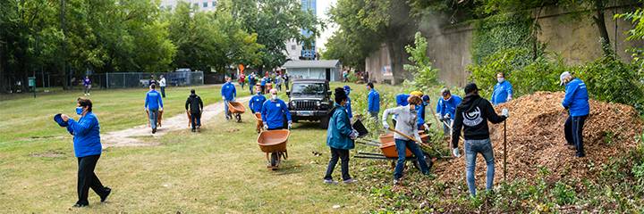 NorthShore employees cleaning up the canal near Evanston Hospital