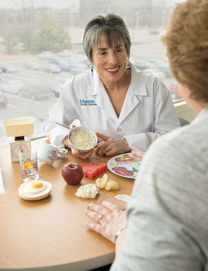 Ellie Feddersen, Diabetes Educator, provides a meal plan for her patient.