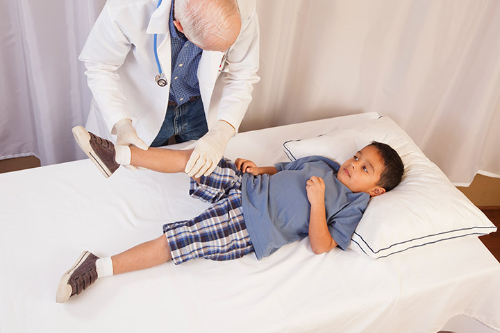 Doctor helping a child