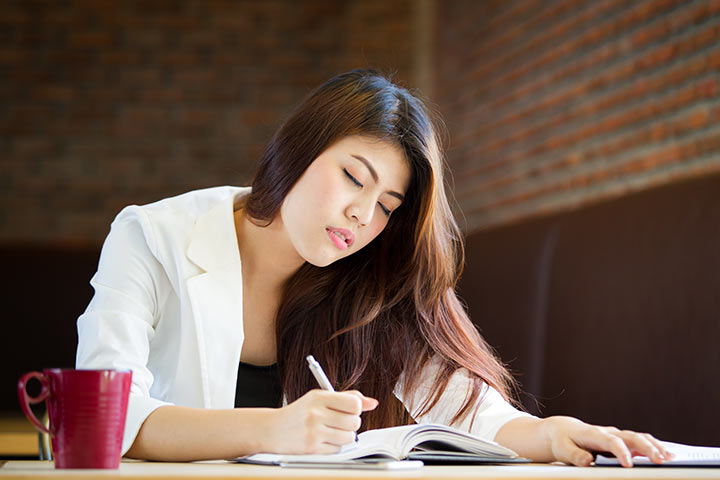 Worker trying to stay awake up at work