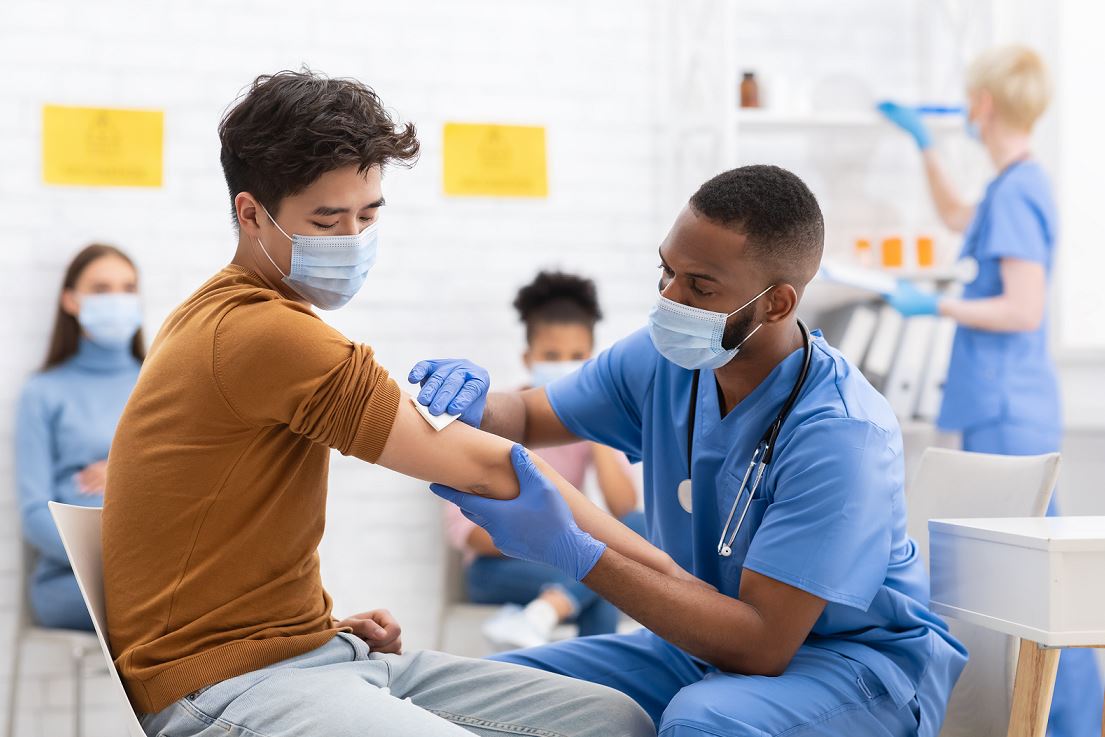 Teen gets vaccinated