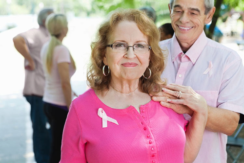 Woman with breast cancer and her husband supporting her