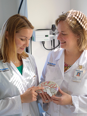 Nurses with model brain