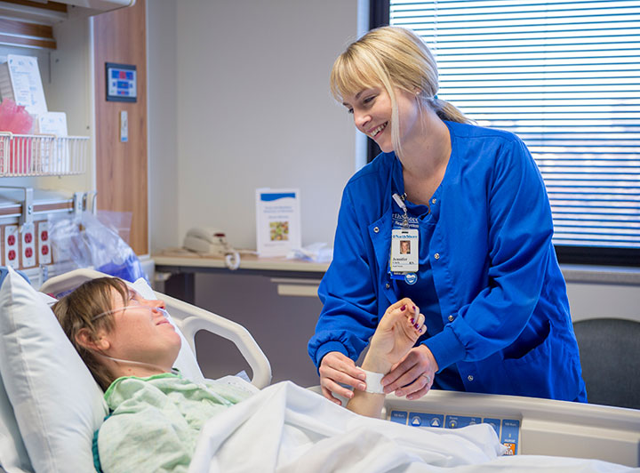 Nurse taking care of her patient