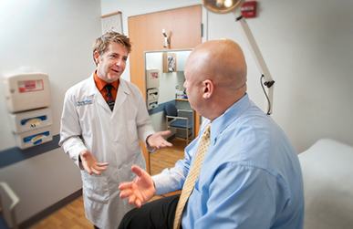 Dr. Jeff Albaugh with patient