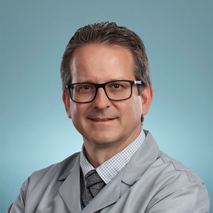 Mark A. Neault, M.D.