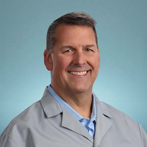 Ervin Woody Denham, M.D.