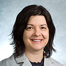 Adela Kola, M.D.